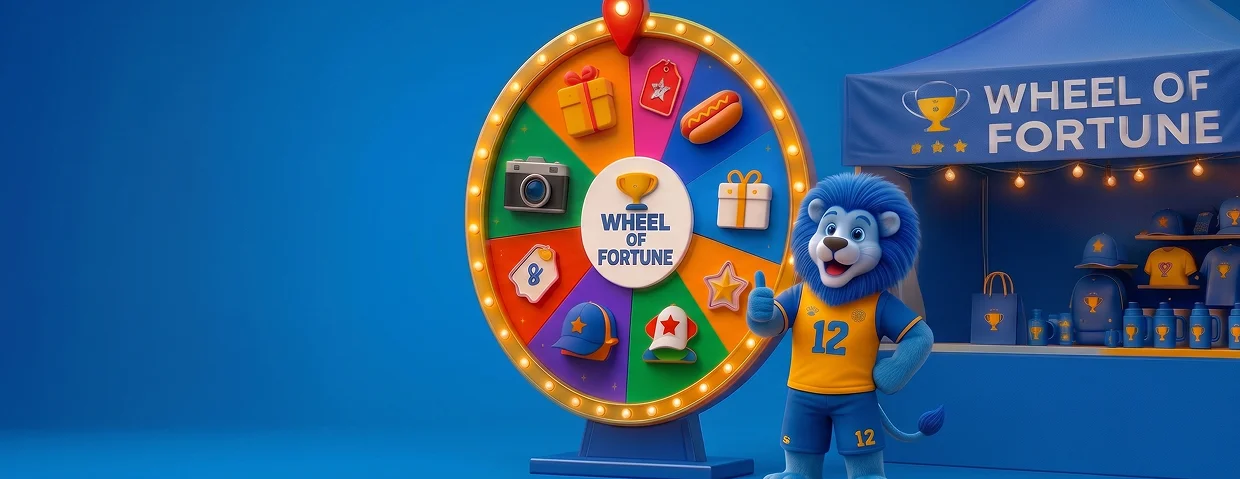 Festival tent with Wheel of Fortune and team mascot